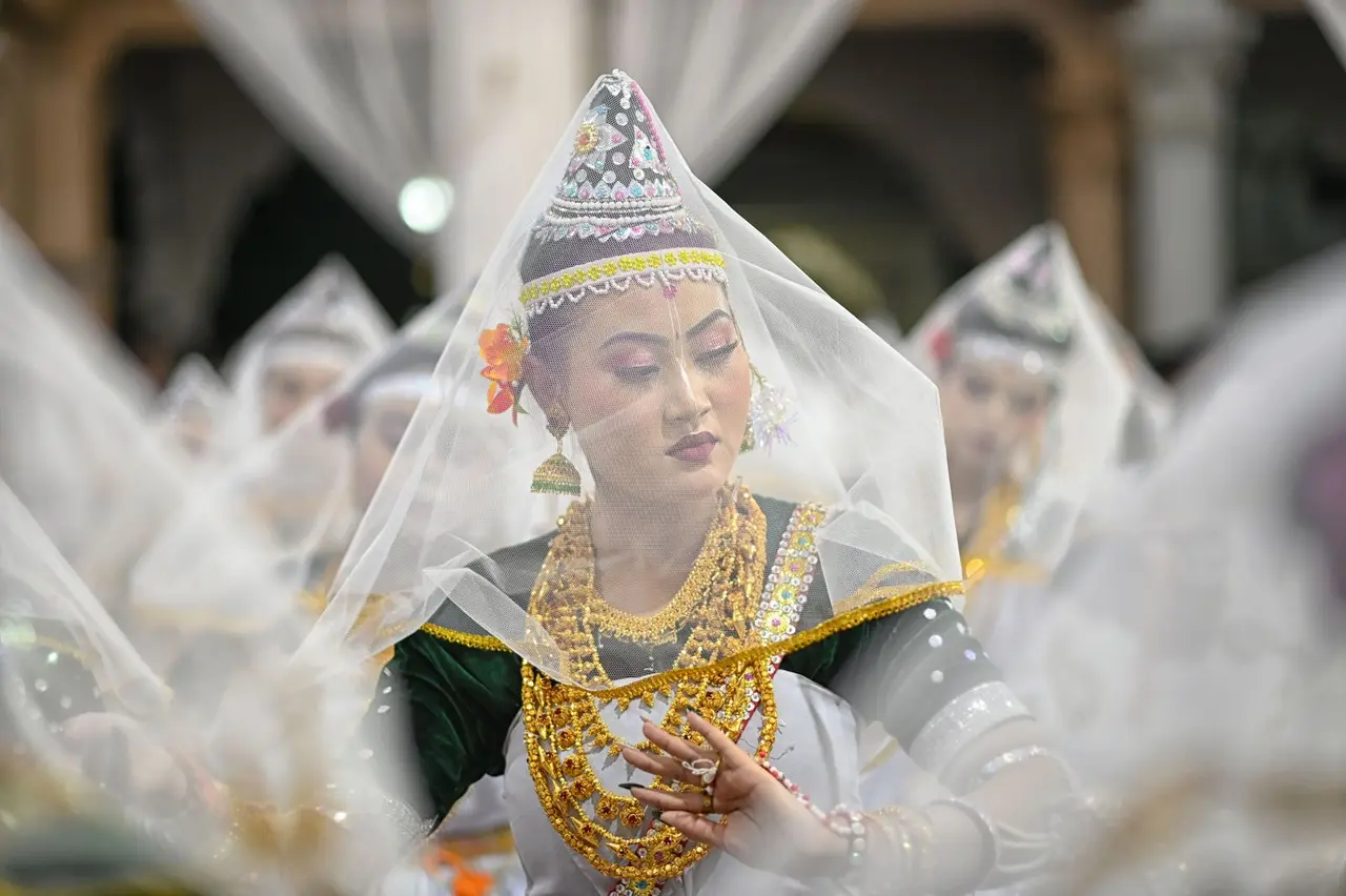 A captivating display of Manipuri dance with traditional attire and expressions.